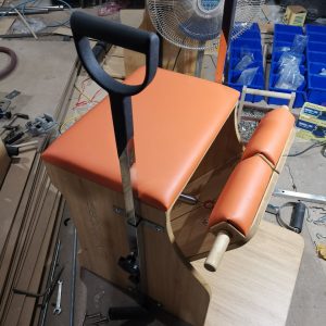 may tap pilates wunda chair mau da cam