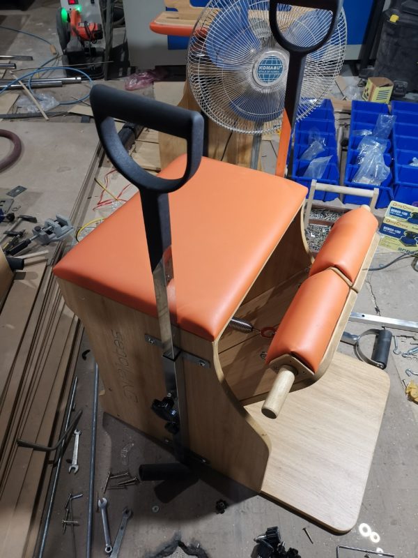 may tap pilates wunda chair mau da cam